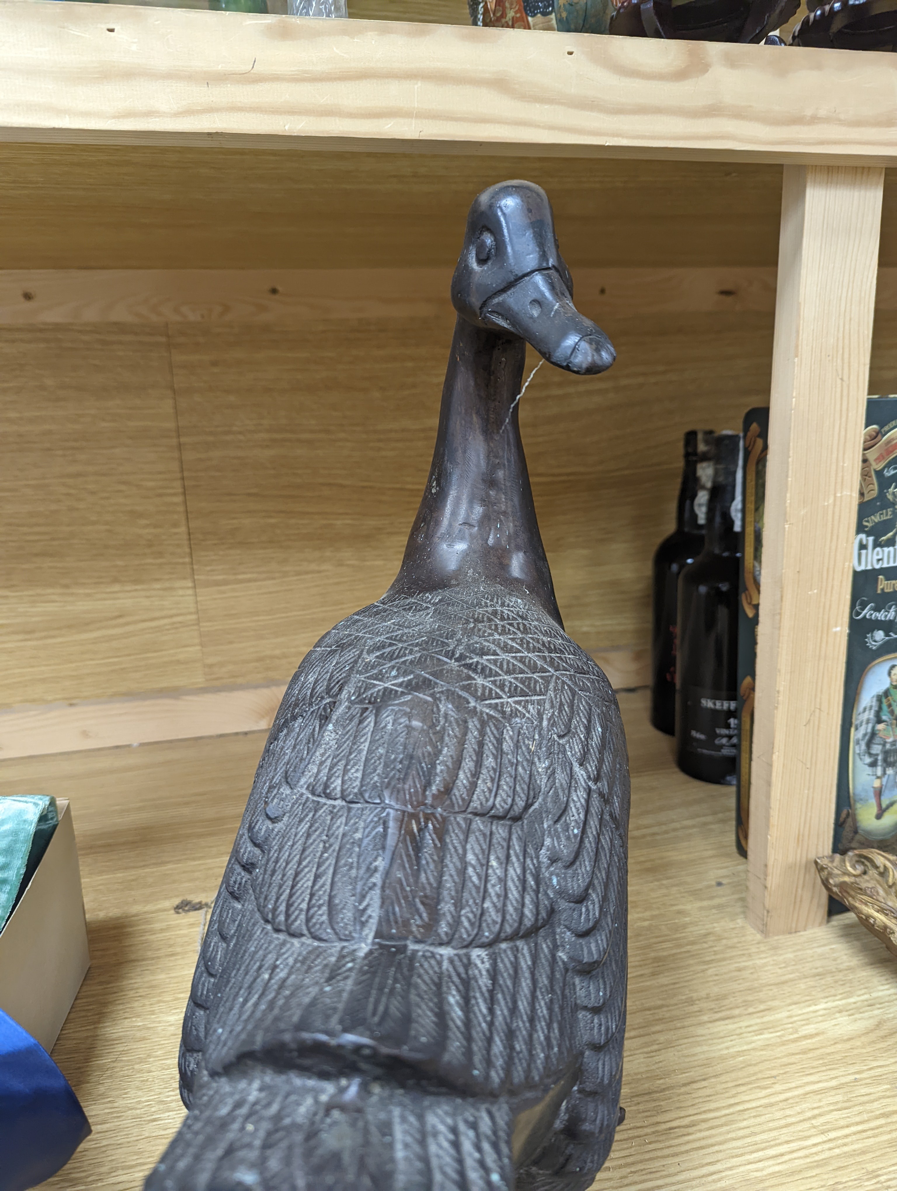 A pair of modern Chinese bronze models of geese, largest 48cm